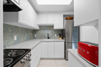 #105 – 1875 W 8th Avenue